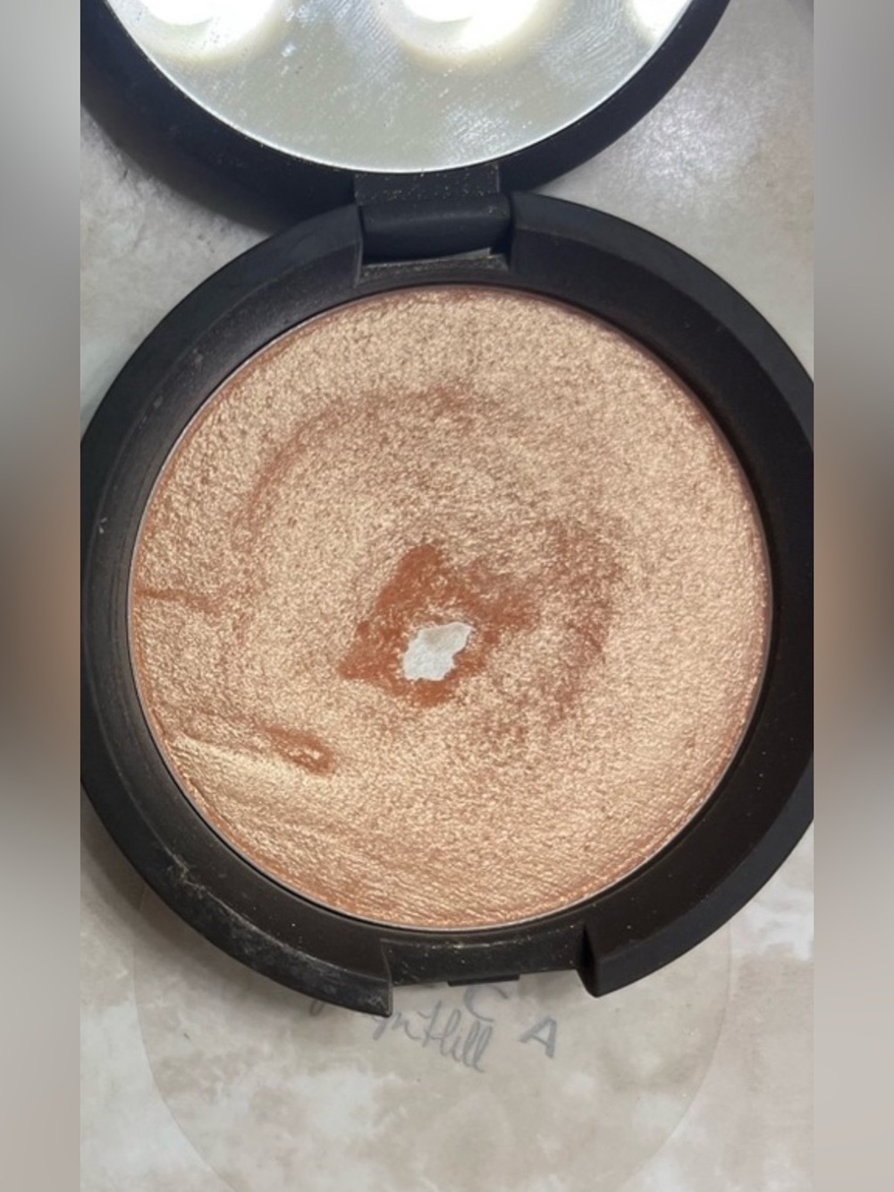 Becca cosmetics champagne pop
